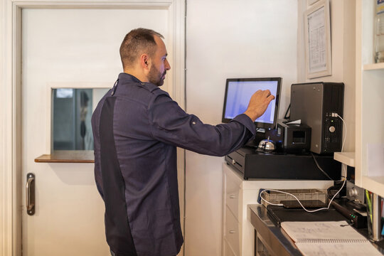 young man working in restaurant