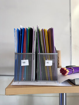 School classroom with Stack of Notebooks with pencil