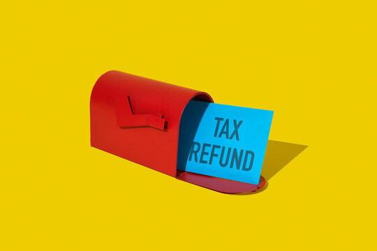 envelope with the text tax refund in a mailbox