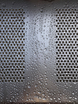 Rain drops on metal surface