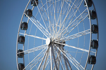 giant wheel sunny day blue sky