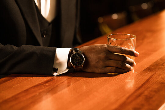 A respectable-looking man in a bar.
