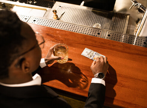 The man at the bar concept 