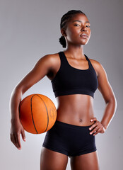 Studio, portrait and black woman with basketball, sportswear and serious for sport with fitness....
