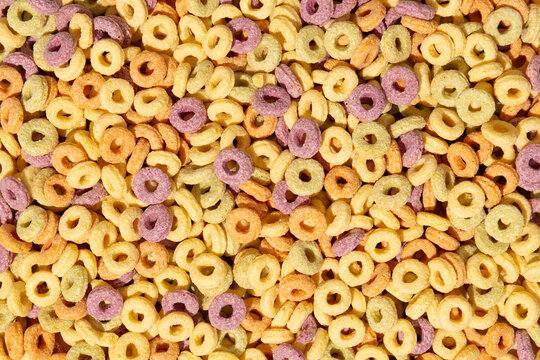 Colorful rings / loops breakfast cereal on blue background