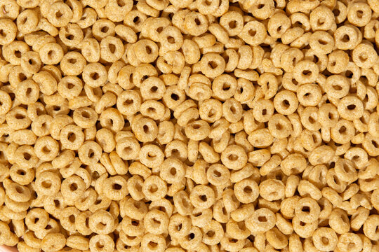 Colorful rings / loops breakfast cereal on blue background