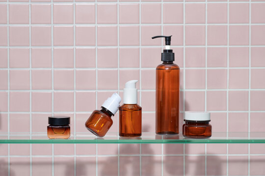 Different Cosmetic Amber Glass Bottles.