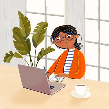 A girl in front of a laptop