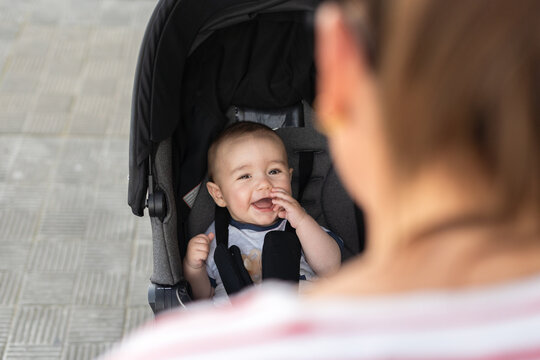 Happy Baby in Stroller


