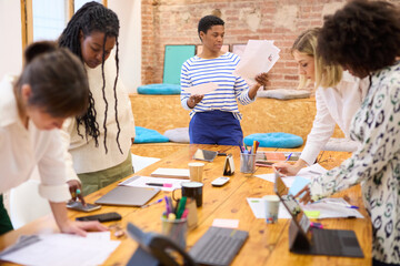 Engaged Team in Office Brainstorming Session