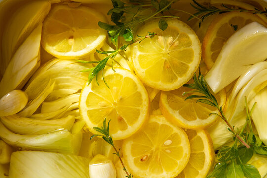 Fennel, herbs, garlic and lemon in ollive oil