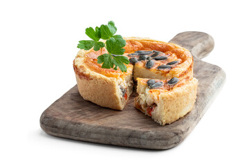 Chicken meat mini pie on wooden board isolated on white
