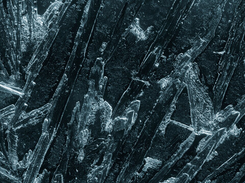 Abstract dark background with ice forming
