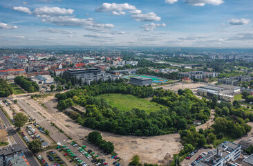 Summer skyline cityscape of district Wilda in Poznań, Poland. Wide panoramic aerial view of the deserted old Edmund Szyc Stadium (Stadion im. Edmunda Szyca)