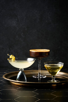 Three Cocktails on a Brass Tray 