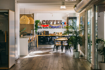 Modern coffee shop interior with natural light