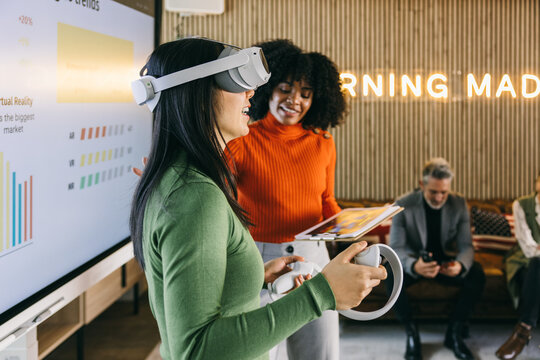 Virtual reality demonstration in modern office setting - Powered by Adobe