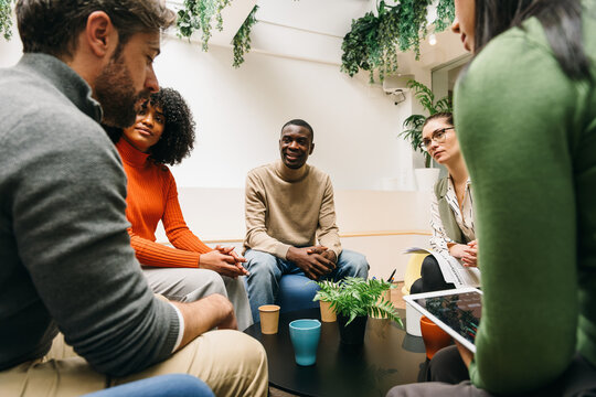 Diverse team engaged in a collaborative meeting