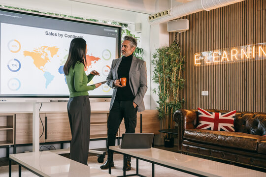 Business meeting with global sales infographic