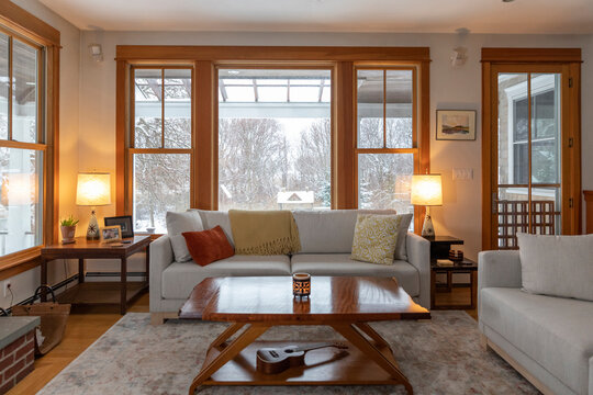 Wide angle Cozy Hygge living room in home  with wood trim 
