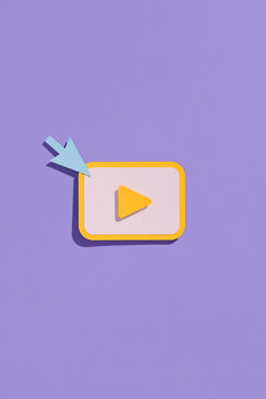 Mouse click with play button on purple background.