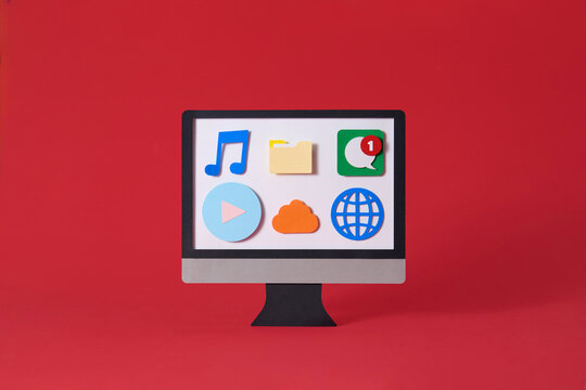 Screen PC with cloud of colorful application icons