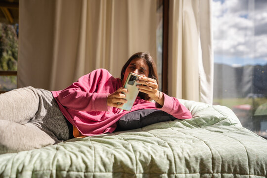 happy woman enjoying her free time at home 