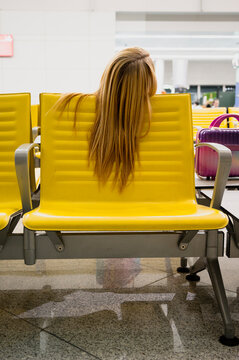 Woman waiting at airport lounge