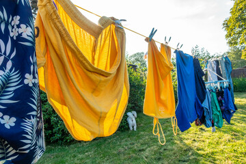 Washing drying on a washing line, catching the last of the day's sunshine.