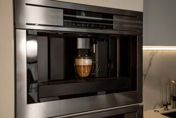 Integrated built-in coffee machine with glass cup