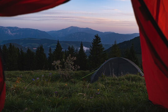 Camping tent in mountains in blue hour.