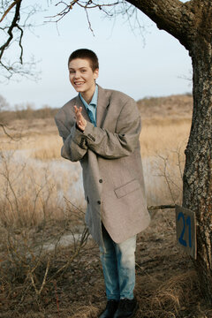 Happy woman in oversize clothes