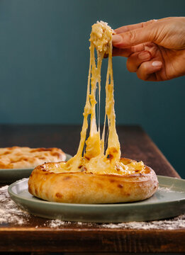 Cheesy Georgian Khachapuri on a Plate
