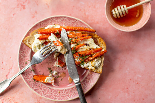 A light meal of roasted carrots with honey on toast
