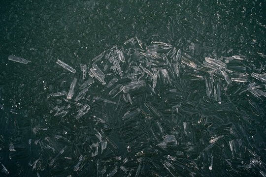 Abstract frozen ice patterns on a lake surface