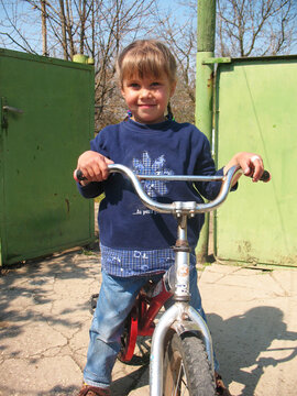 a girl on a bicycle