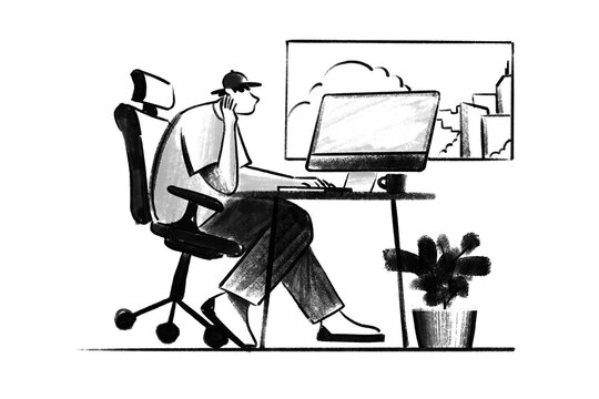 Man working online at computer, home workplace.