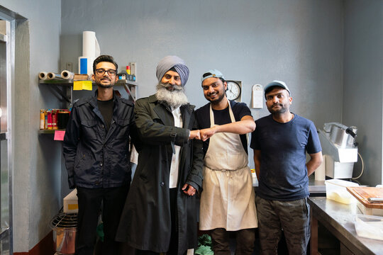 Indian Restaurant Workers At The Kitchen