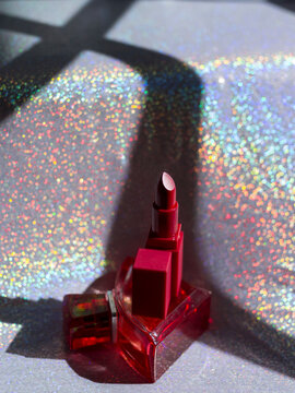 perfume and lipstick still life
