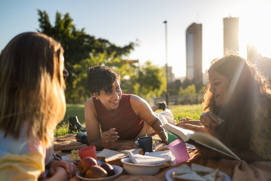 Friends having a picnic outdoors in Brisbane