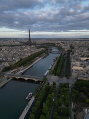 Aerial view of Eiffel Tower at sunrise, along with views of the Seine river in Paris, France