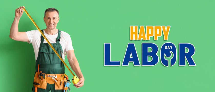 Mature builder with tape measure on green background