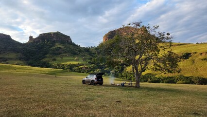 Car in a camping close to the hills