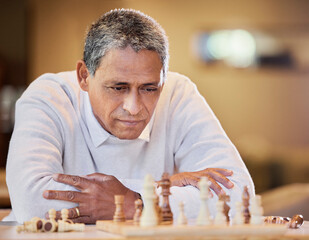 Mature man, chess and alone with thinking for strategy, outdoor for mental solution to challenge. Male person, park and board game with planning, problem solving with cognitive skills in retirement