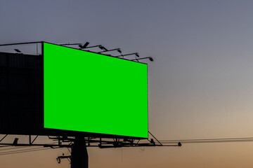 advertising sign with green background, spectacular billboard with chroma key with sunset in Brazil