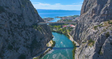 AERIAL: Flying above the gorge of Cetina river flowing out into the Adriatic sea