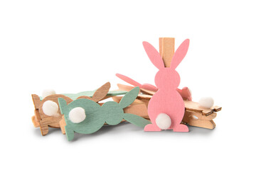 Clothes pegs with colorful hares on white background
