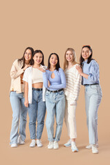 Fototapeta premium Young women on beige background. Hen Party