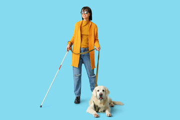 Blind woman with guide dog on blue background