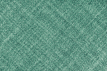 Jacquard woven coarse diagonal weave texture upholstery green fabric. Textile background, furniture...